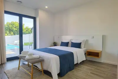 Image de Maison de vacances 'Casa Da Oliveira' avec piscine commune, Wi-Fi et climatisation