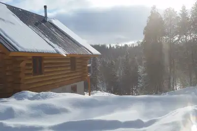 Image de Chalet bois rond aux paysages uniques avec spa!
