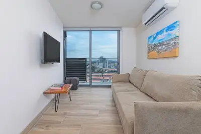 Image de Cozy apartment with breathtaking views. Access to pool and cowork.