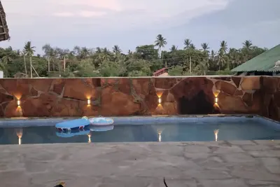 Image de Maison luxueuse de 4 chambres avec piscine privée à Kikambala