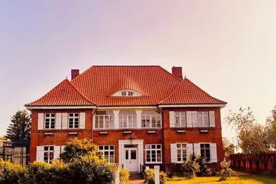 Image de Quiet vacation in large apartment near Wismar, 5 adults, 1 baby bed. Garden view