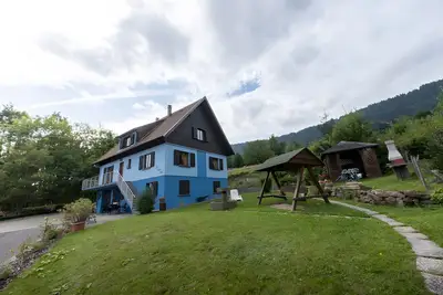 Image de Appartement « Le Bouleau - Gîte Les 4 Vents » avec vue montagne, jardin partagé et Wi-Fi