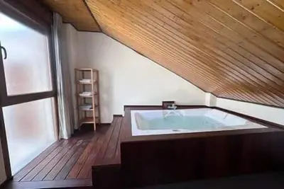 Image de House with Jacuzzi + Piped Music