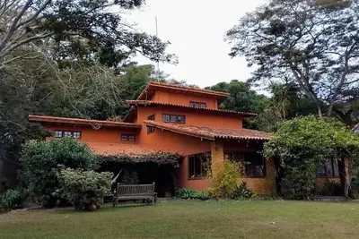 Image de 4-bedroom country house 20 minutes from Itaipava, inside a gated community.