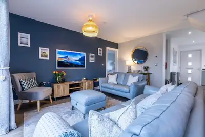 Image de Meet Ty Wawr. A modern, pet‑friendly new build near Benllech Beach, with unlimited free golf at Stor