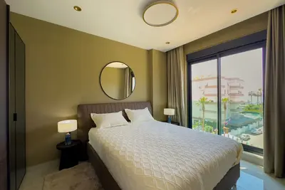 Image de Qoople Eхсellence B-19 neue Wohnung am Meer by Interhome