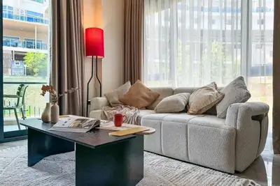 Image de Qoople Eхсellence A-14 neue Wohnung am Meer by Interhome