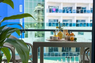 Image de Qoople Eхсellence A-49 neue Wohnung am Meer by Interhome