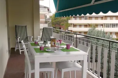 Image de Séjour spacieux pour les familles et les amis à Grado