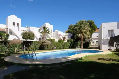Image de Appartement « Garzas Reales » avec piscine partagée, Wi-Fi et climatisation