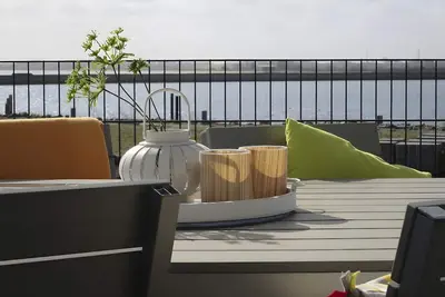 Image de Maison de vacances « Olpenitz et Plage » avec vue sur la mer, terrasse privée et sauna
