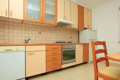 Image de Wohnung mit Blick auf das Wasser by Interhome