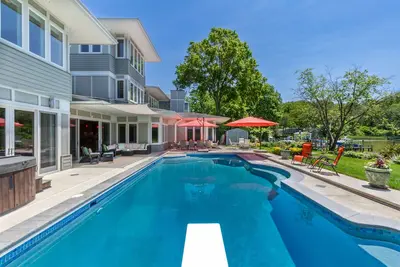 Image de Lakefront home with private pool, hot tub, outdoor space, central Ac, & W/D