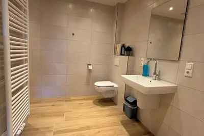 Image de Vacation apartment 6 persons, near Cloppenburg, bedroom with Tv and single beds