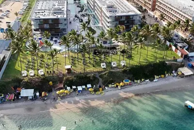 Image de Feet in the sand on Muro Alto Beach in a resort that has everything for your family.