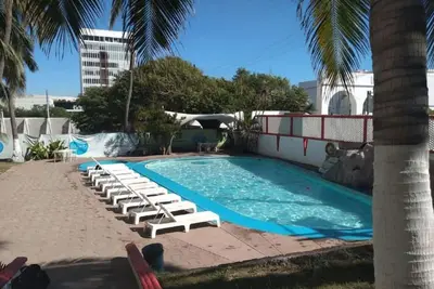 Image de Seaside Retreat: Comfortable Room with Clean Beds and Panoramic Ocean Views