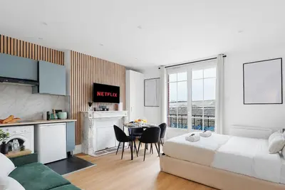 Image de Studio d'Architecte avec Cheminee - Design -4 personnes