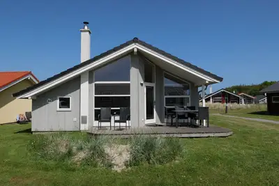 Image de Scandinavian 62m² vacation home with sauna, wood-burning stove & terrace