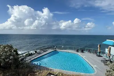 2 bed, 2 bath, Ocean views, 3 Pools, Walk to Beach