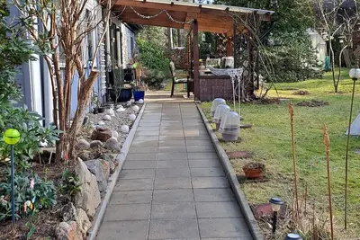 Image de Cozy vacation home on Lake Lübbesee with terrace, garden and jetty on the lake