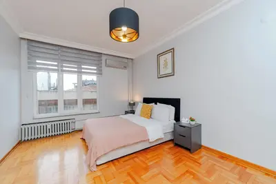 Image de Four-Bedroom Family Suite - Central Location with Elevator & Two Bathrooms