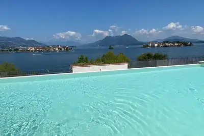 Image de MyLago Apartment with pool and lake view