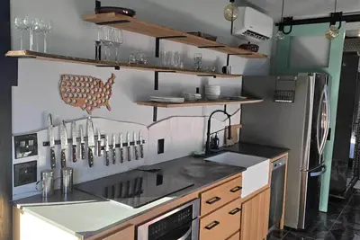 Image de Eco-Chic Container Tiny Home + Treehouse Deck