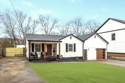 Image de Spacious 4-bedroom 3. 5 Bath, fenced home with Gym 10 min from Braves Stadium