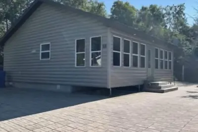 Image de Chalet chaleureux et accueillant près de l'eau
