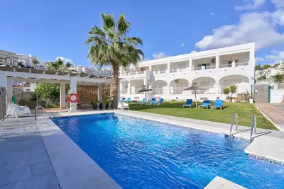 Image de Appartement 2' avec piscine partagée, Wi-Fi et climatisation