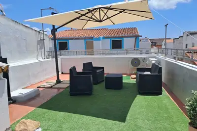 Image de Maison de vacances au centre du village avec terrasse privée, Wi-Fi et climatisation