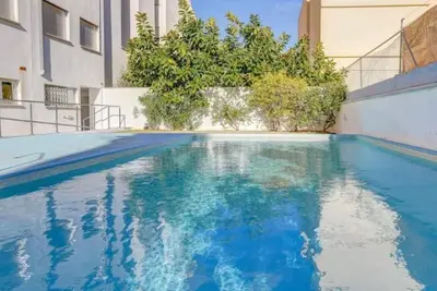 Image de Appartement « Pollentiamar » avec piscine partagée, Wi-Fi et climatisation