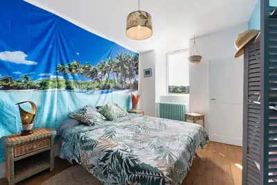 Image de Chambre d’hôtes « Les Philous Gourmands - Caraïbes » avec jardin partagé et Wi-Fi