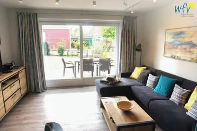 Image de House Dünenblick: Fantastic vacation apartment with balcony, terrace, garden