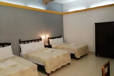 Image de Triple-Bed Room in Mérida’s Heart — Close to Paseo Montejo & Downtown