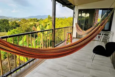 Image de 10 minutes from Pereira! Among the green mountains. Large spaces and peace.