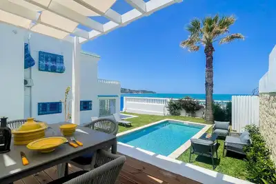 The Sea House beach front villa with pool