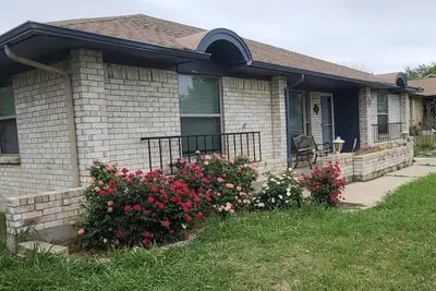 Image de 4 bed, 2 baths, 2 king, 1 queen, 2 full close to At&T Stadium, Dfw Airport