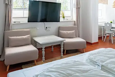 Image de Comfortable vacation apartment Strandflieder in the vacation home at Gutspark Dranske