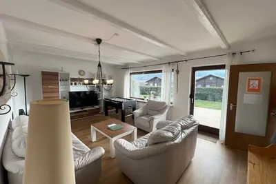 Image de On 75 m², up to 5 people + dog will find space to feel good, play and relax.