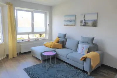 Image de Appartement « Ferienwohnung Seepferdchen » avec vue sur la mer et balcon