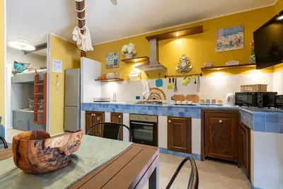 Image de Maison de vacances « Fiamma » avec vue sur la mer, terrasse privée et climatisation