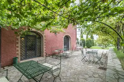 Image de Chambre avec Wifi, piscine privée, climatisation, Tv, véranda, animaux admis, près de Pérouse