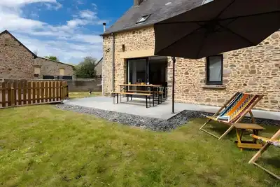 Image de Maison de vacances 'Chez Manie et Mablot' avec terrasse, jardin privés et Wi-Fi
