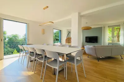 Image de Duplex neuf 12 personnes centre ville, à 5 minutes à pied de la plage!