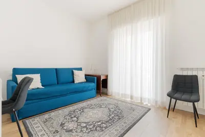 Image de GuestHost - Cozy 50m2 apartment, perfect for 4 people, located on the 7th floor of a building with lift in the Calvairate district, the eastern area of ​​the city of Milan, a stone's throw from Porta Romana. The apartment is well connected to the cent