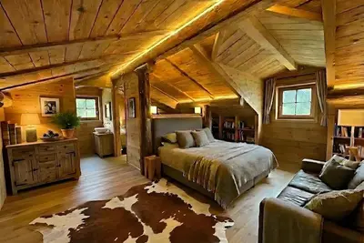 Image de Chalet « Silenthia » – Retraite alpine de luxe entre Dolomites et lac de Garde