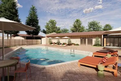 Image de 4 Inviting Rooms for Family Adventures | Pool, Spa, Lawn & Red Rock Views