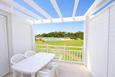 Image de T2 Cosy vue piscine, dans résidence front de mer