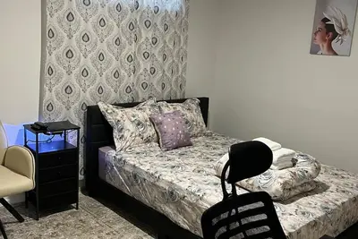 Image de Homely Comfort Room. Shared washroom with One